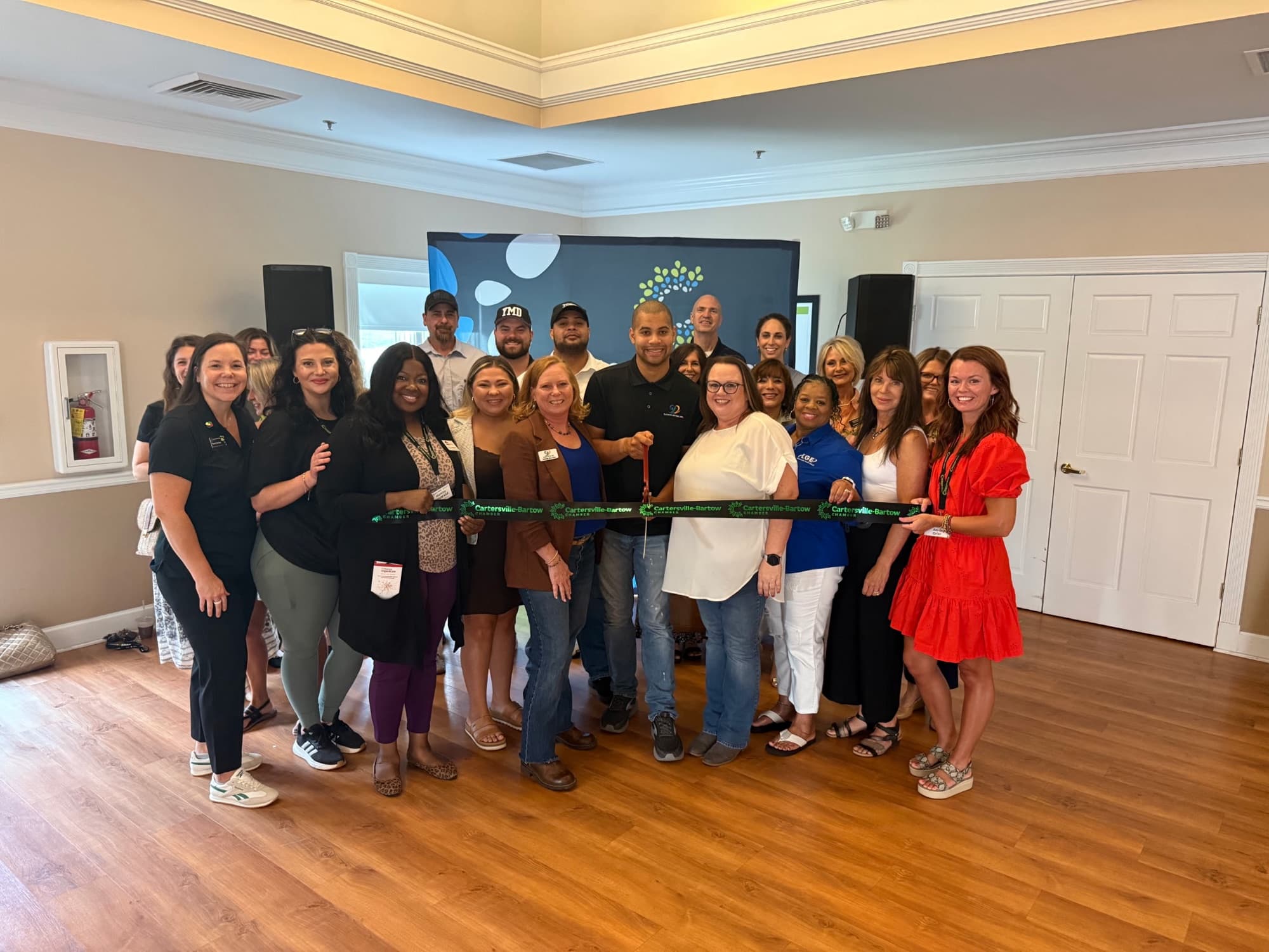 Elevate Autism supporters gathered for the official ribbon cutting with the Cartersville-Bartow Chamber of Commerce